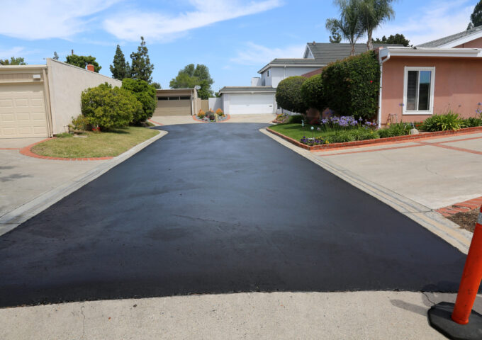 Private drive way, street rehabilitation and slurry seal project finished with crews expertly applying the slurry seal. Re-surfaced Cul-de-sac or driveway.